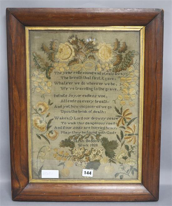 A framed sampler 1828 44 x 31cm